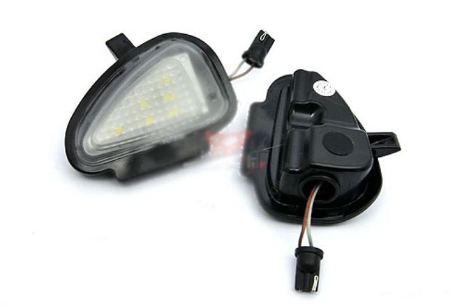 Hovedbilde Golf 6 og Touran under speil ...